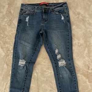 Blue ripped skinny jeans